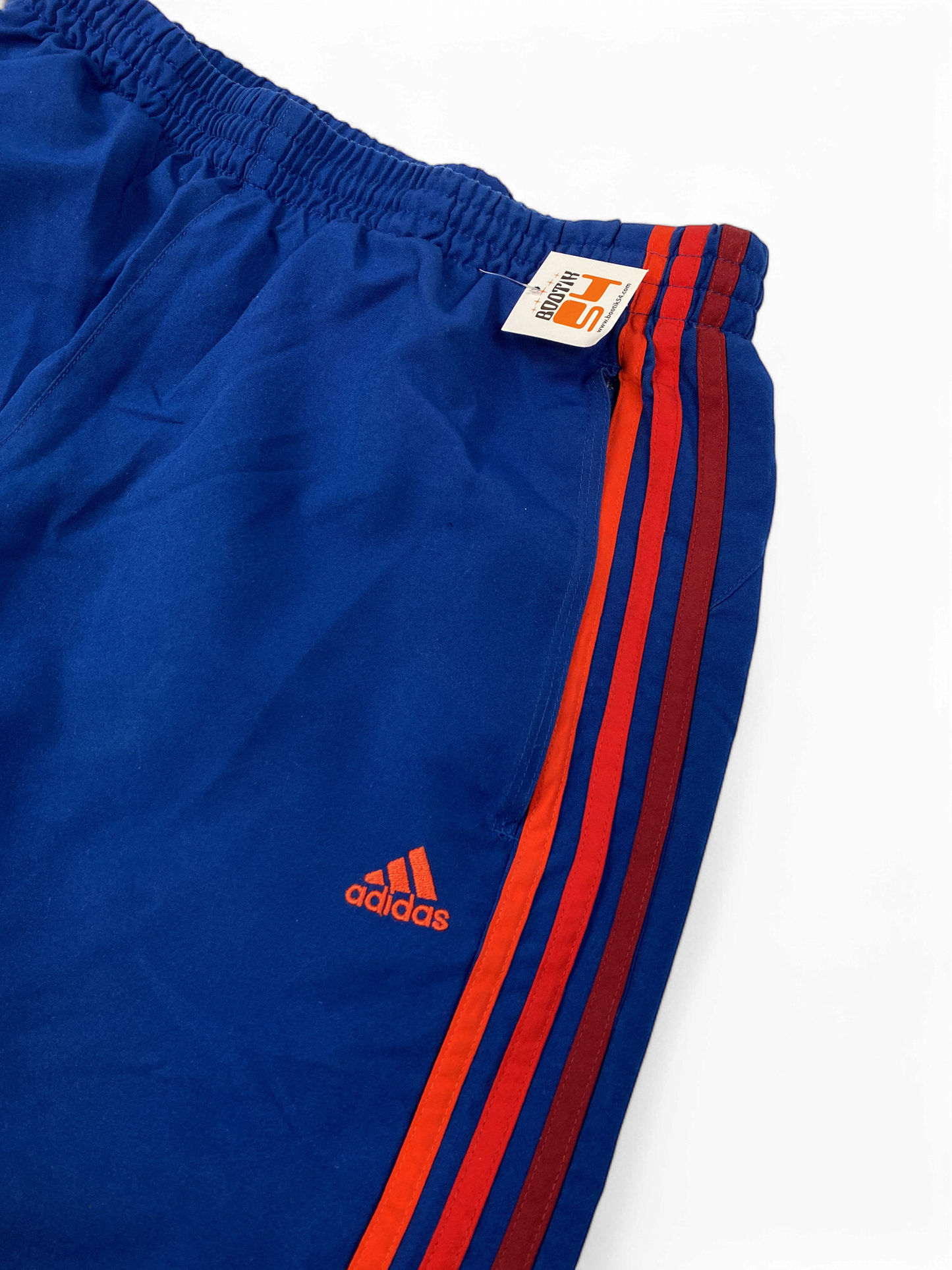 Adidas Blue Track Pants with Red Stripes